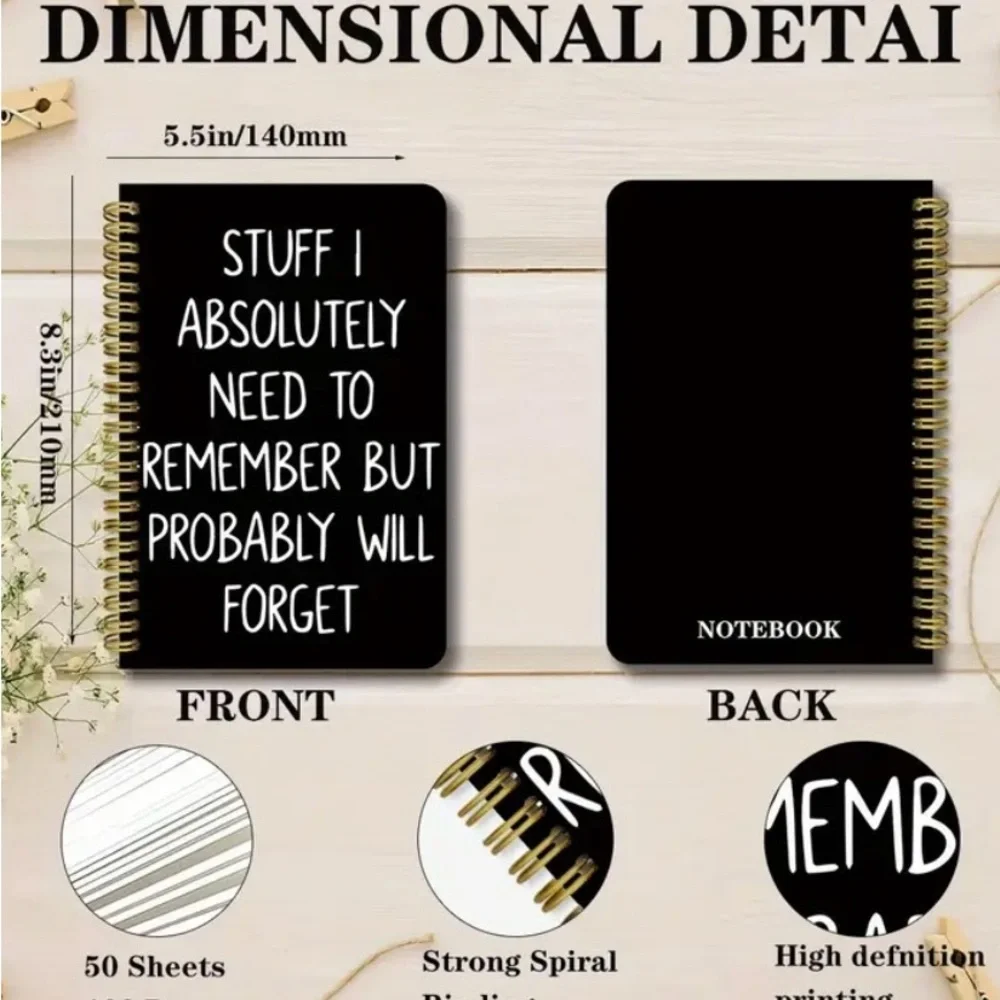 Black Spiral Notebook with White Text